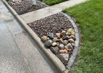 dams Landscape Design Stone- cobblestone Installation - example